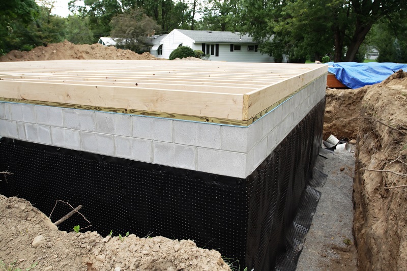 New basement foundation with weatherproofing