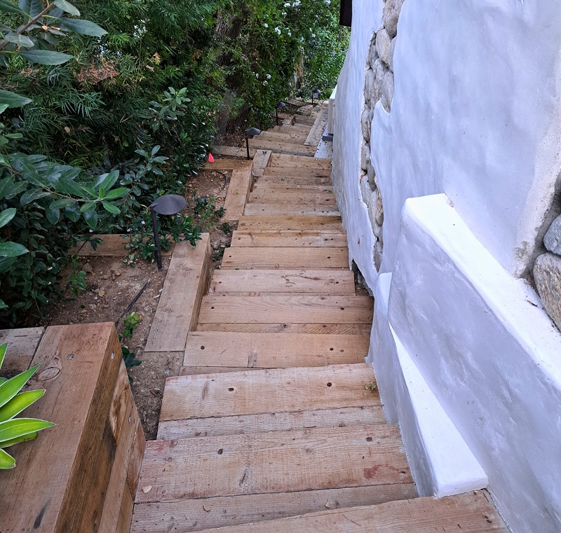 View of the outdoor curved stairway built snug into the hillside of Paraiso de Rocas Antiguas
