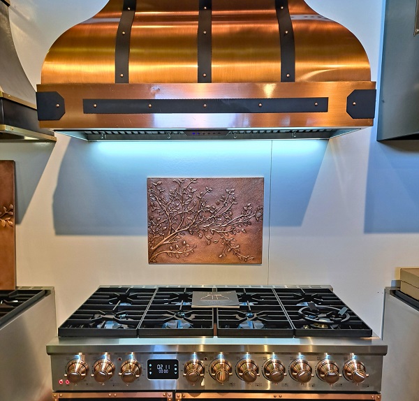 Akicon copper range hood displayed at WestEdge Design Fair 2025