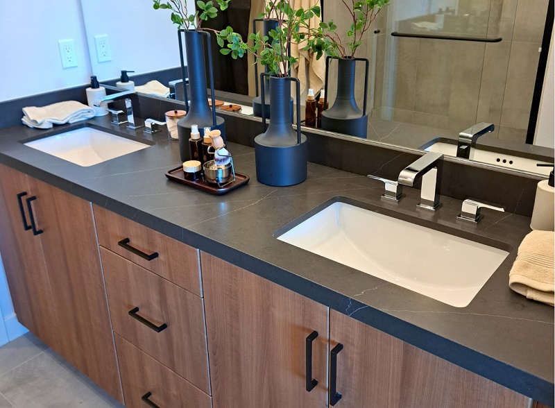 Double vanity bathroom with dark gray quartz countertop