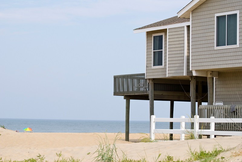 Traditional beach house on stilts with deck