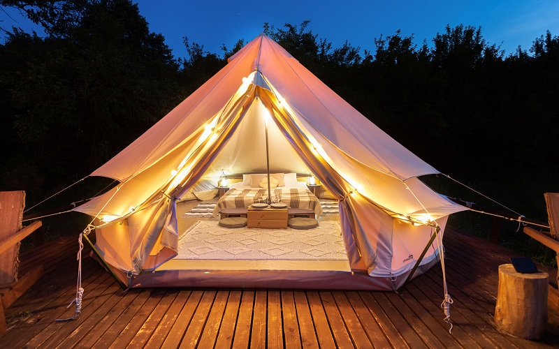 Backyard glamping on the deck at night