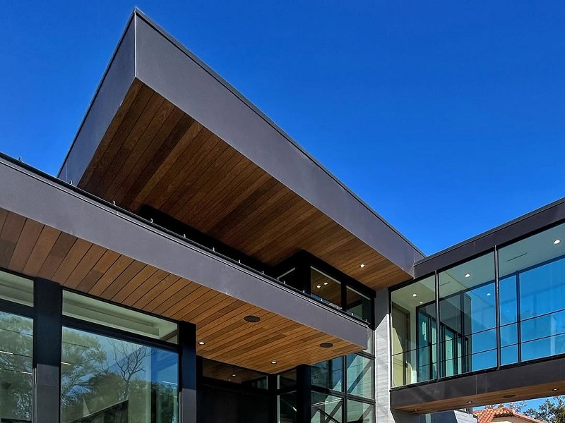 TNAH 2026 Front exterior overhang with wood cladding. Photo by Michael Wenrich Architects