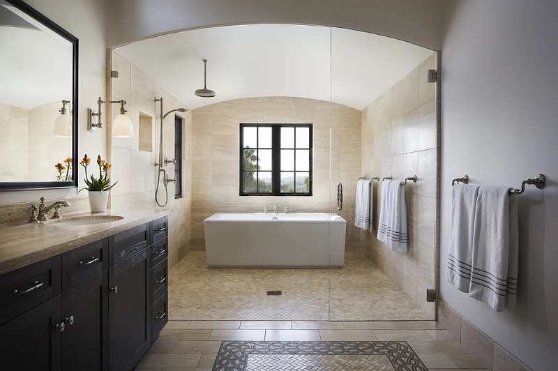 Elegantly designed master bath wet room that is wheel chair accessible