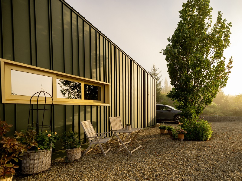 Modern green metal cabin
