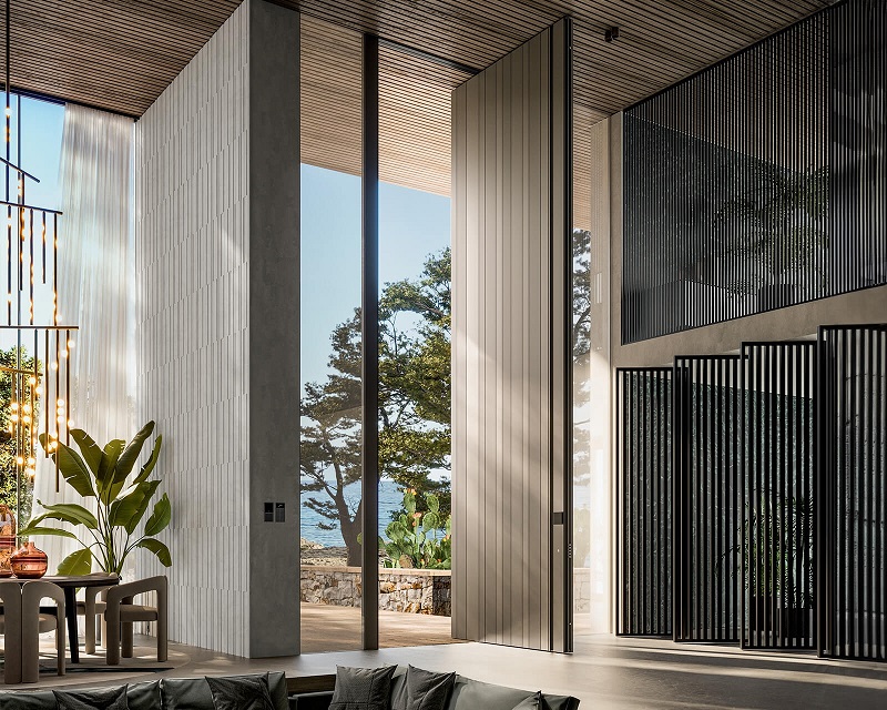 An expansive Synua safety pivot door by Oikos