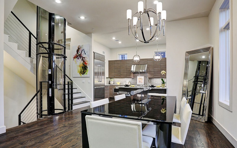 Stylish vacuum elevator by PVE on the second floor of home