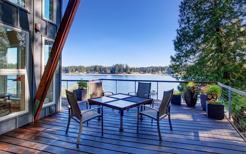 Elevated deck with views of nearby lake