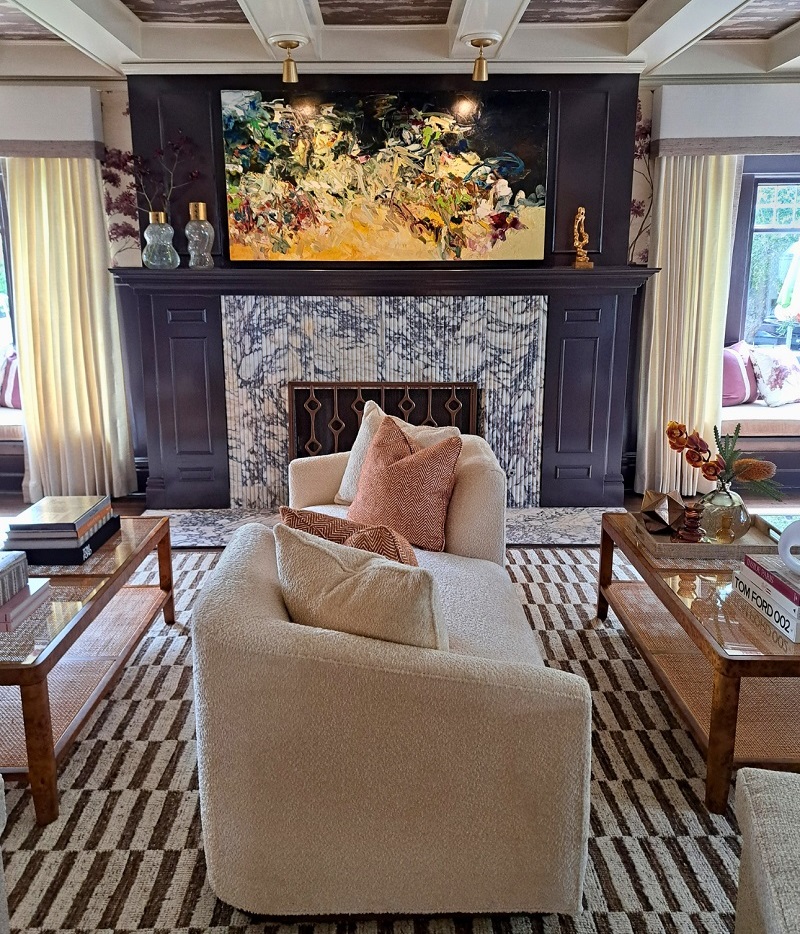 View of the highly versatile bouclé tête-à-tête sofa that connects both sides of the enormous living room