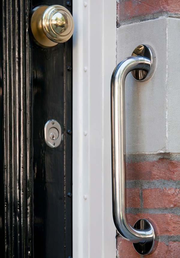 A safety grab bar at the front door