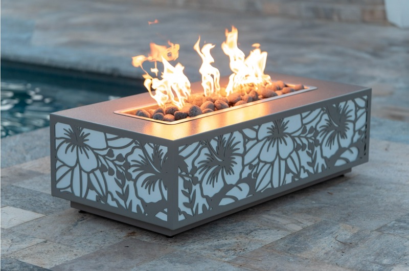 A gray biophilic fir pit by The Outdoor Plus