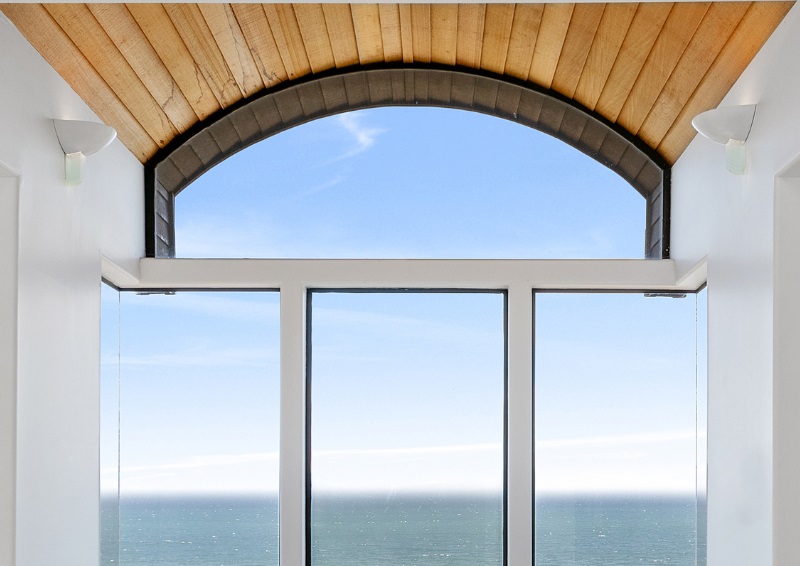 Waterfront home with large low-glare windows