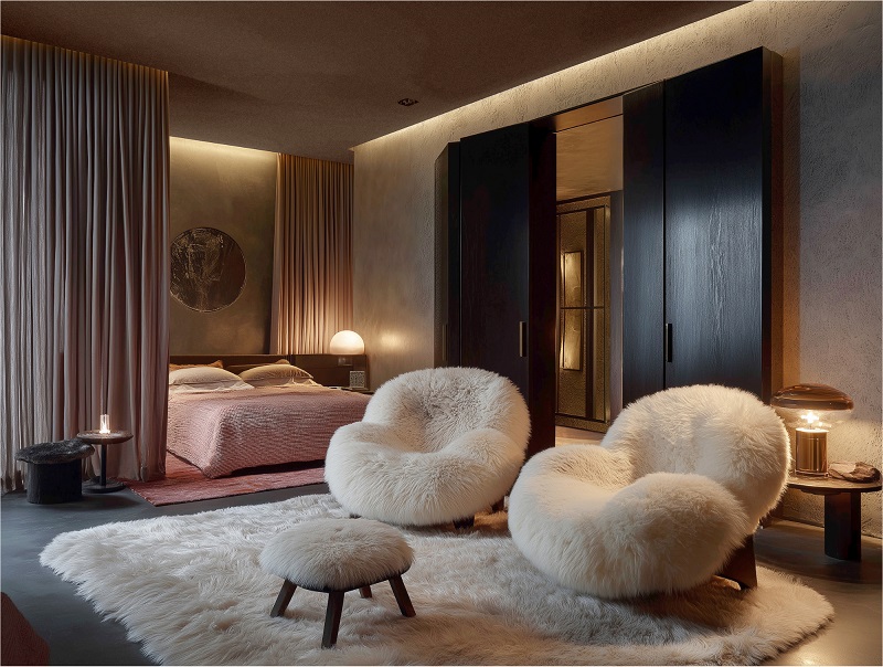 Rendering of a comfortable bedroom with warm, soft lighting